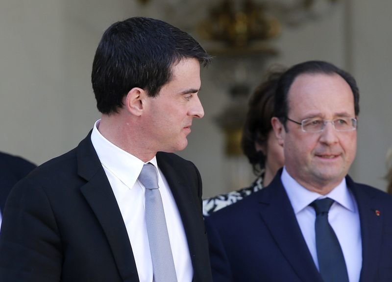 Valls y Hollande abandonan el Elíseo al término del Consejo.