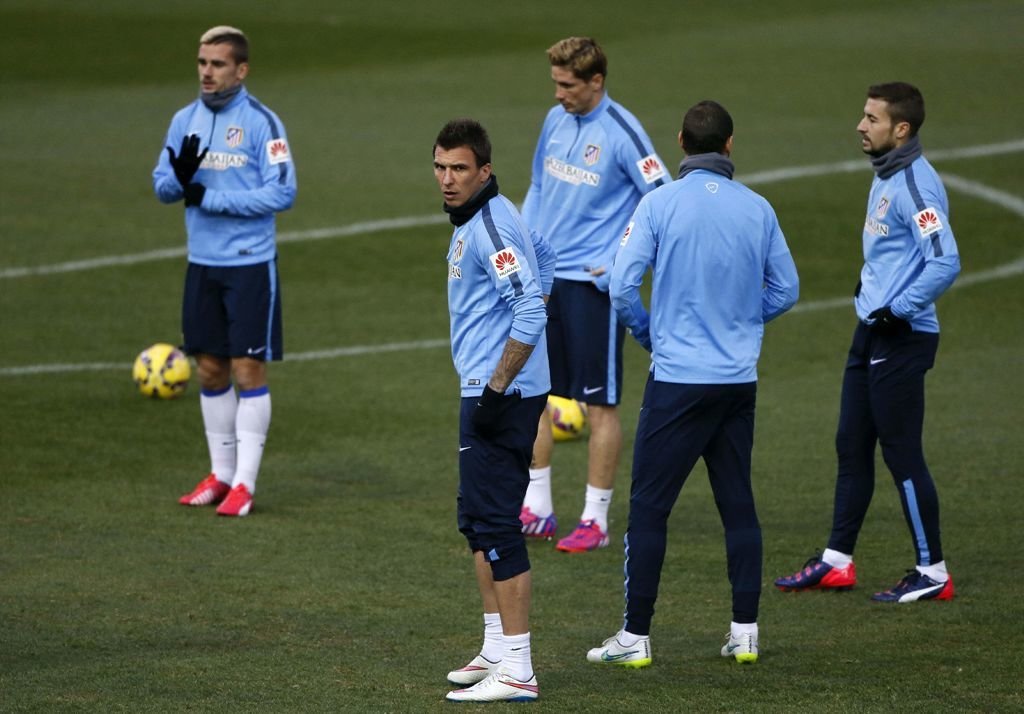 Jugadores del Atlético de Madrid, en el entrenamiento de ayer.