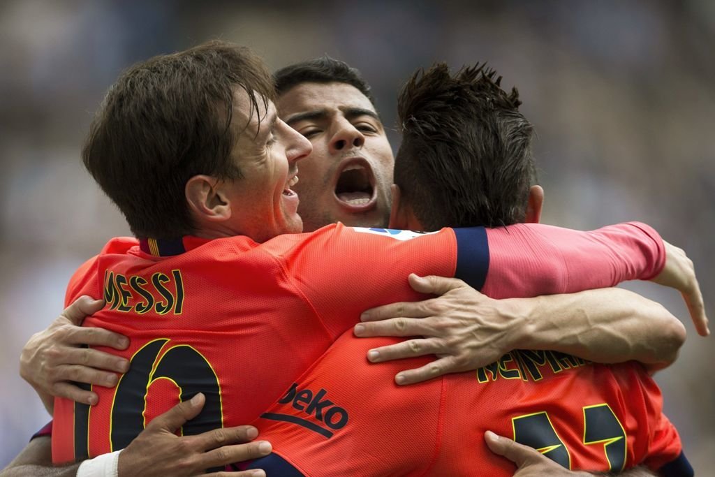 El ex céltico Rafinha celebra con Messi y Neymar el segundo gol del Barcelona contra el Espanyol.