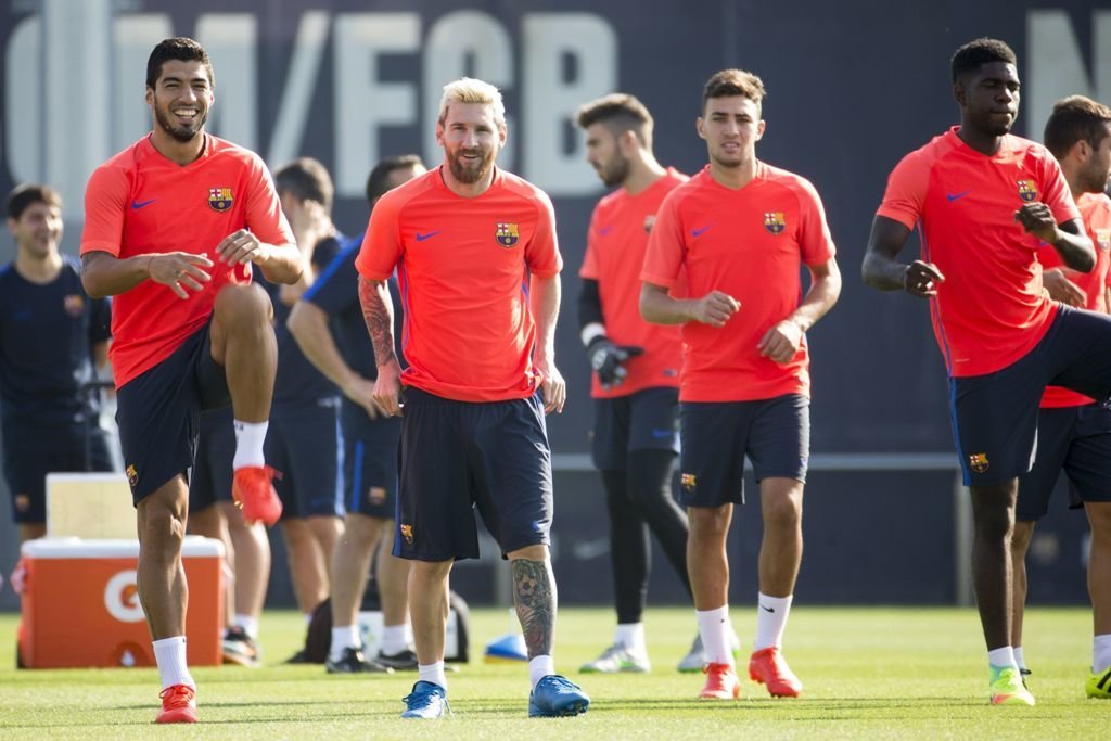 Munir, junto a Leo Messi durante un entrenamiento con el Barcelona esta pretemporada.