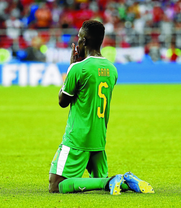 El jugador de Senegal Idrissa Gueye celebra la victoria lograda ante Polonia en el primer partido.