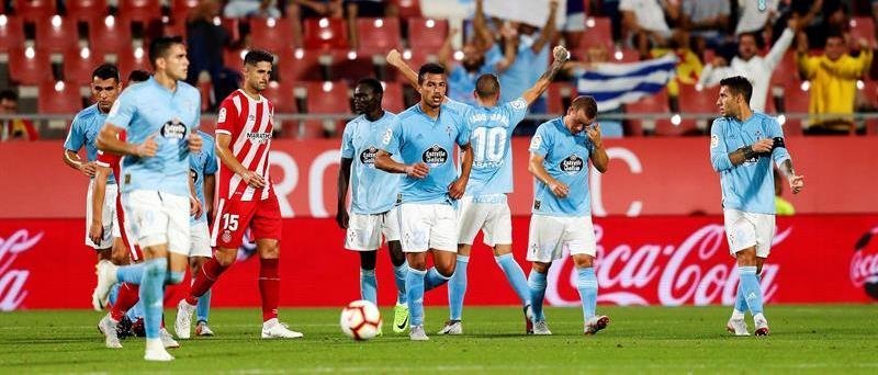 El delantero del Celta de Vigo Iago Aspas (c) celebra su gol ante el Girona