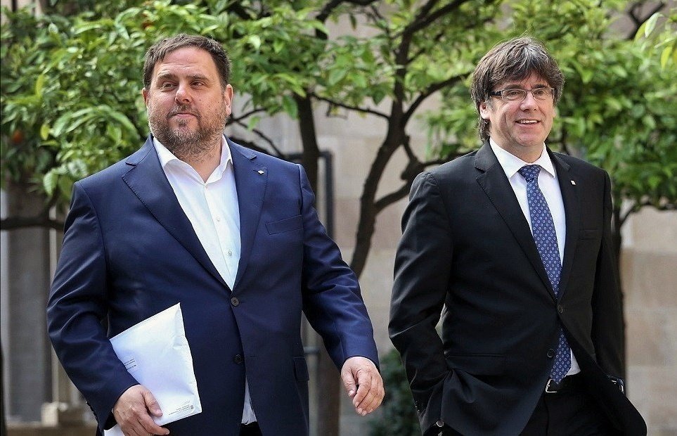 El expresidente de la Generalitat, Oriol Junqueras, Y Carles Puigdemont