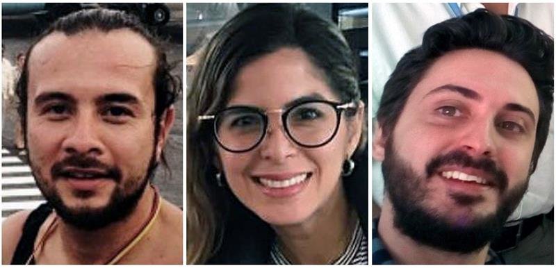 Los tres periodistas de la Agencia EFE, los colombianos Mauren Barriga (c); el fotógrafo Leonardo Muñoz (izda), y el español Gonzalo Domínguez, que fueron detenidos por las autoridades de Venezuela en Caracas