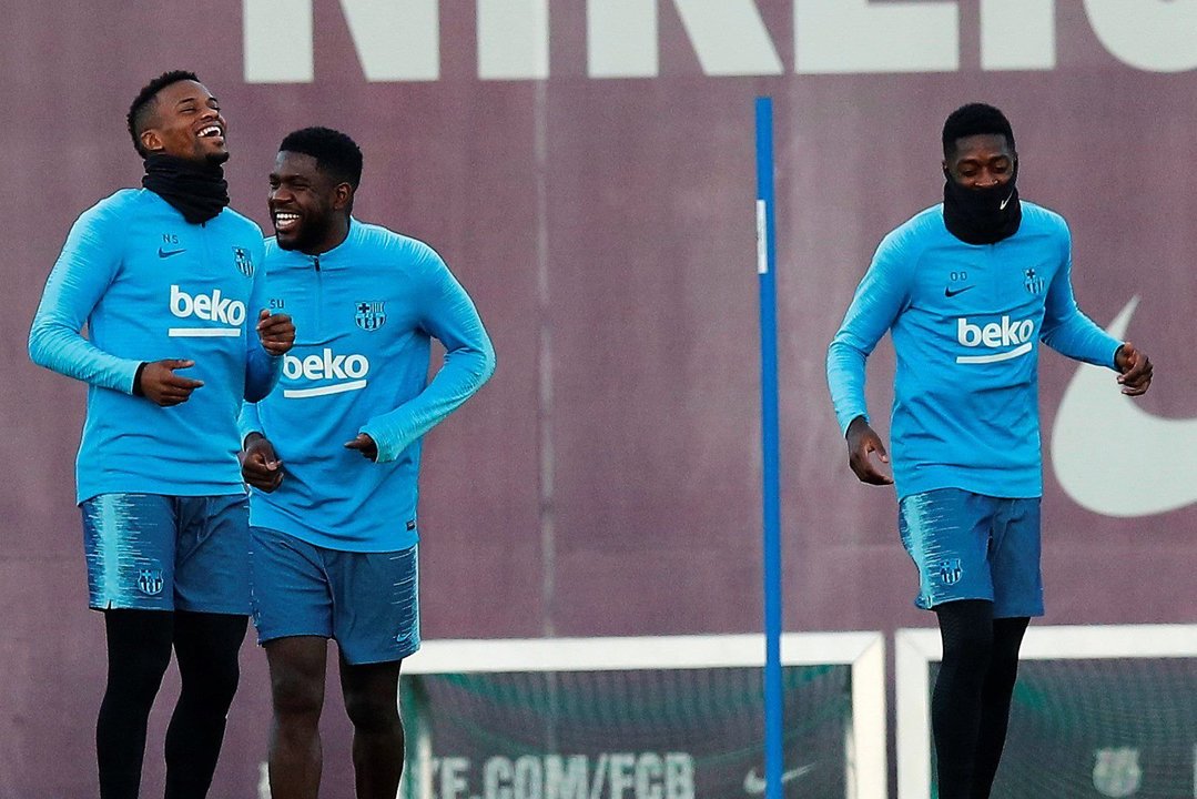 Semedo, Umtiti y Dembélé, en un entrenamiento del Barça antes de encarar la Liga de Campeones.