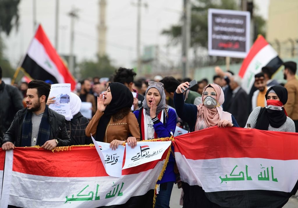 Estudiantes iraquíes durante sus protestas por las calles de la capital Bagdad.