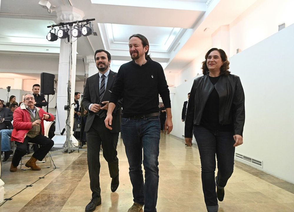 Garzón, Iglesias y Colau, al inicio del acto político en Madrid.