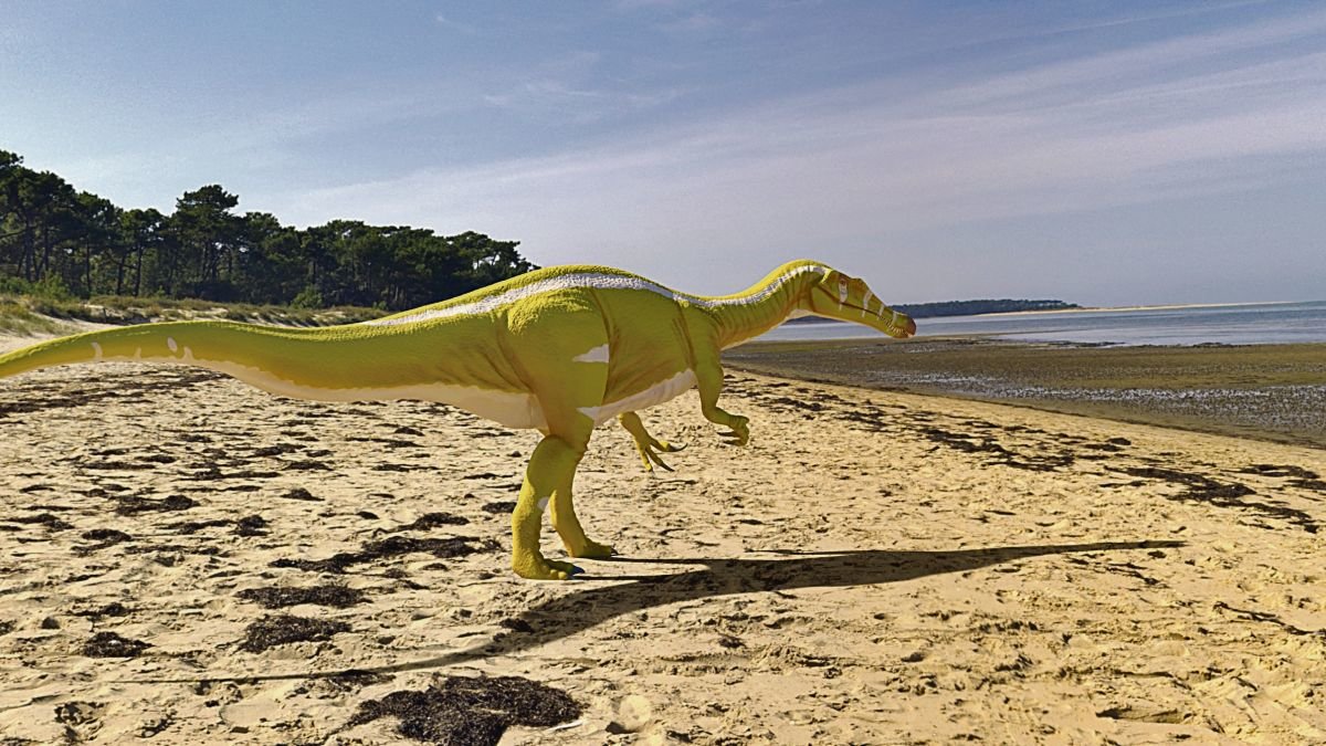 Recreación artística de un ejemplar de una nueva especie de dinosaurio, un espinosaurio bípedo y carnívoro.