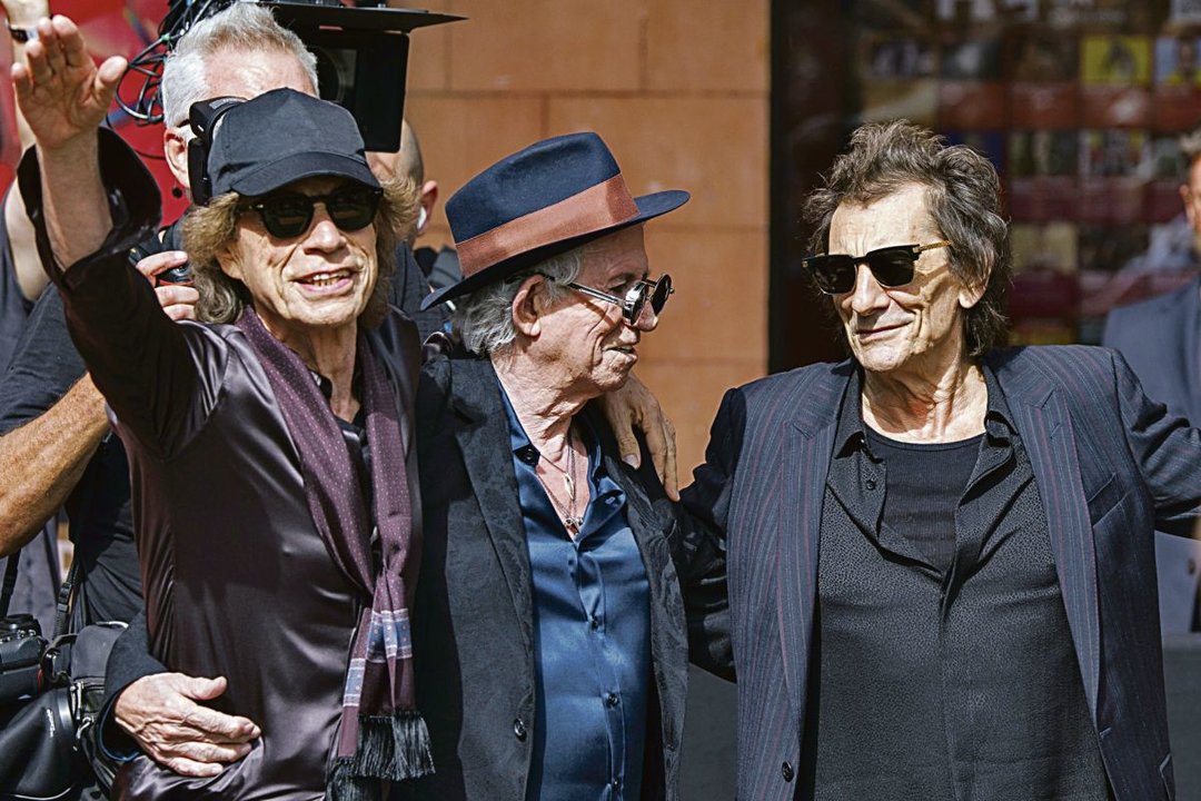 Mick Jagger, Keith Richards y Ronnie Wood, ayer en Londres.